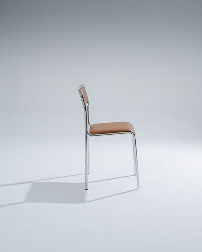 PAIR OF TUBULAR STEEL AND COGNAC LEATHERETTE CHAIRS, 1980s