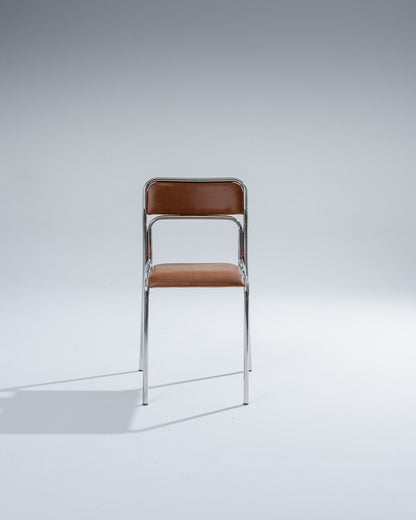 TUBULAR STEEL AND COGNAC LEATHERETTE CHAIR, 1980s