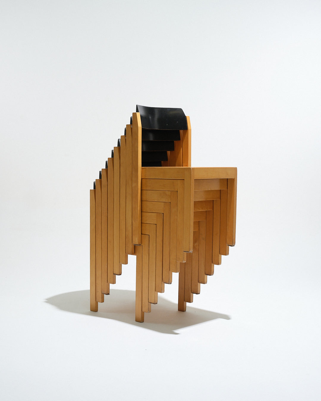 Set of 8 stackable wooden chairs, 1950s