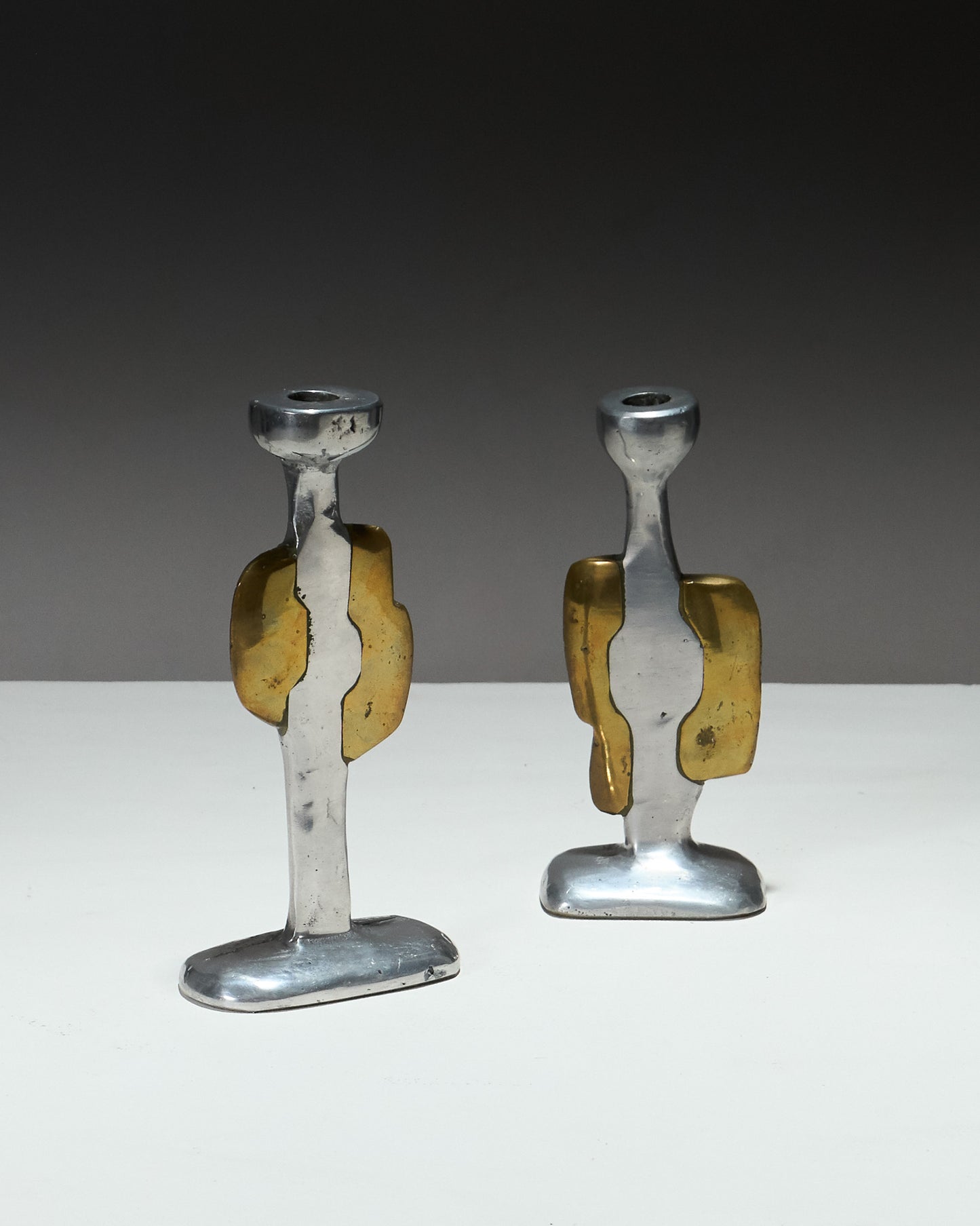 PAIR OF BRUTALIST CANDLESTICKS, 1970s 