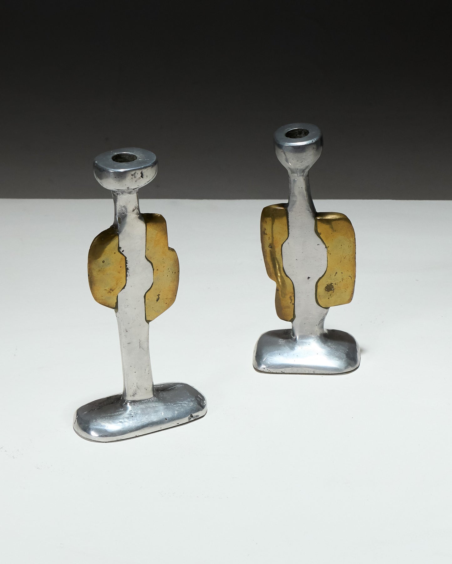 PAIR OF BRUTALIST CANDLESTICKS, 1970s 