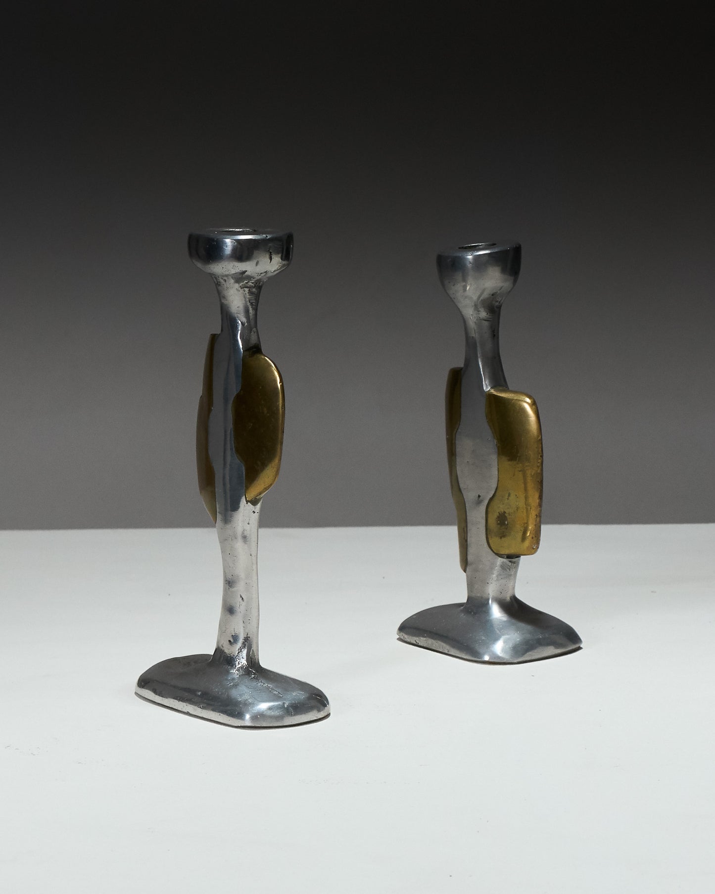 PAIR OF BRUTALIST CANDLESTICKS, 1970s 