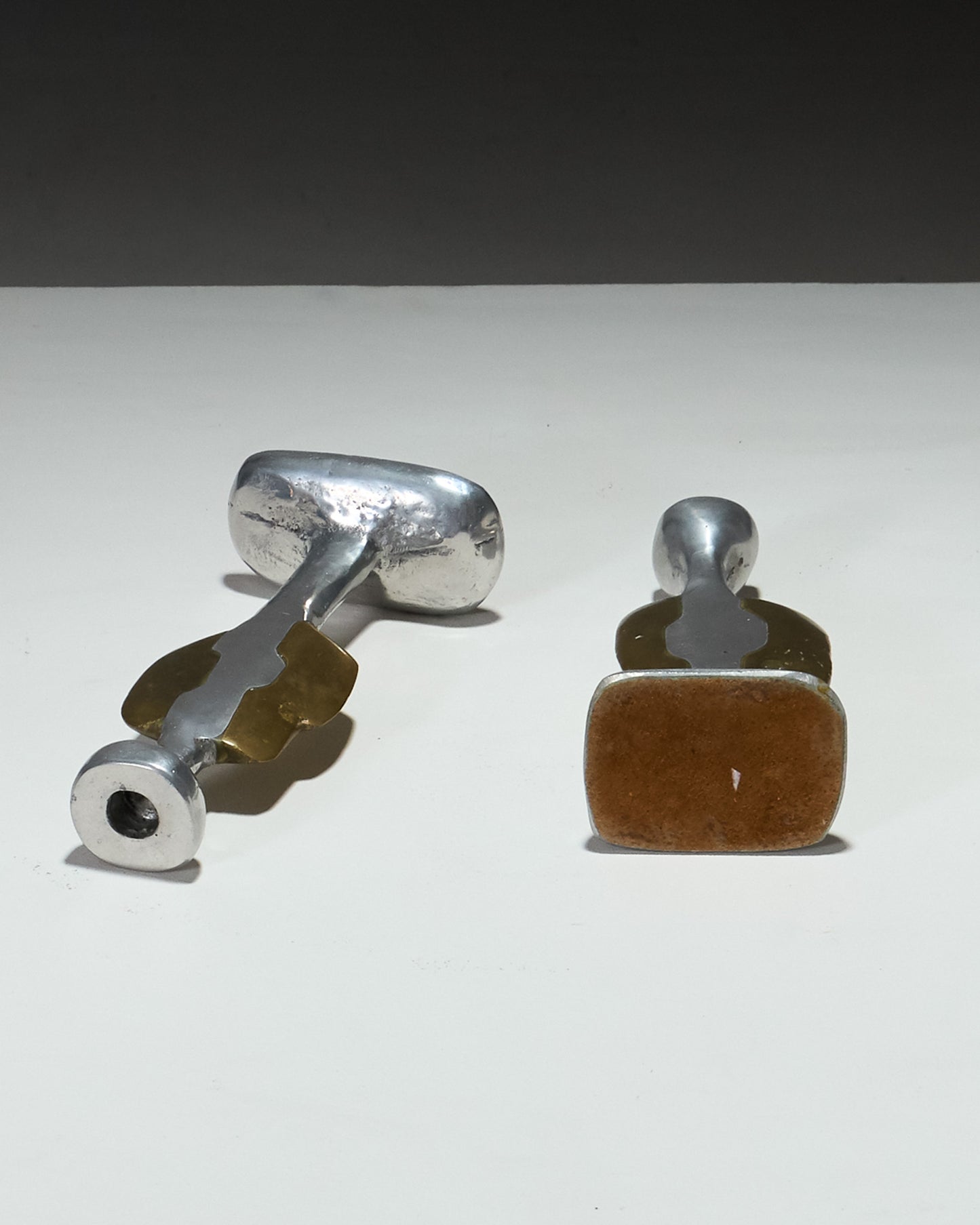 PAIR OF BRUTALIST CANDLESTICKS, 1970s 