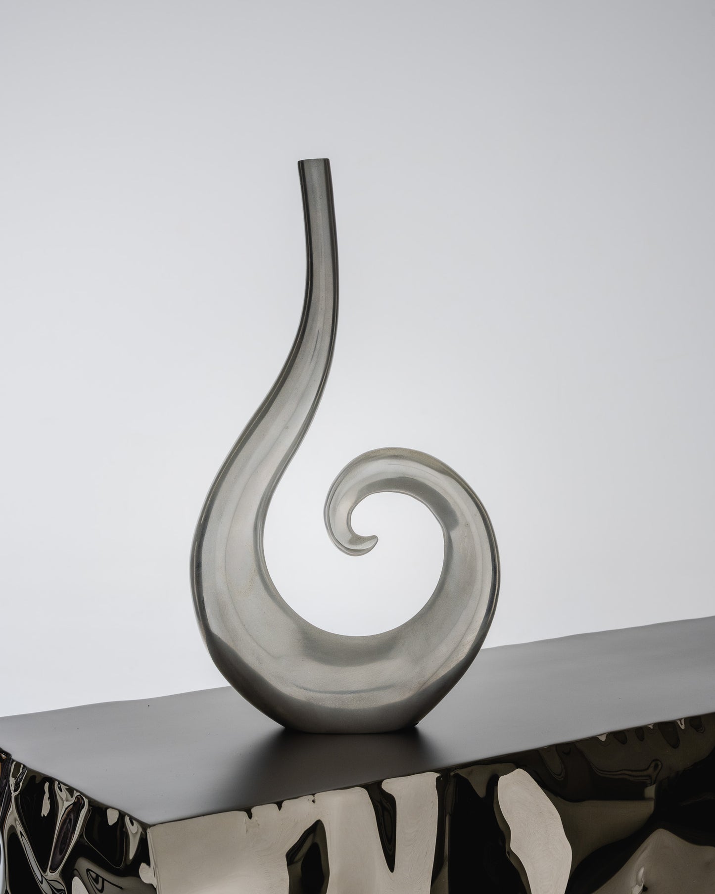 SOLIFLORE CURLY IN ALUMINUM, 1980s