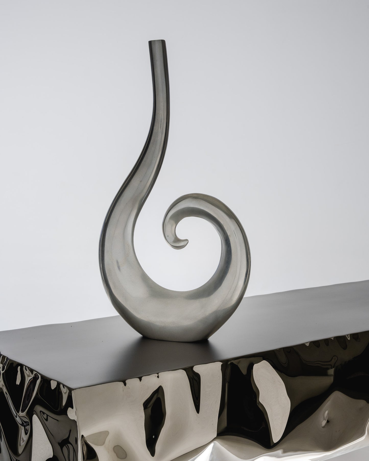 SOLIFLORE CURLY IN ALUMINUM, 1980s