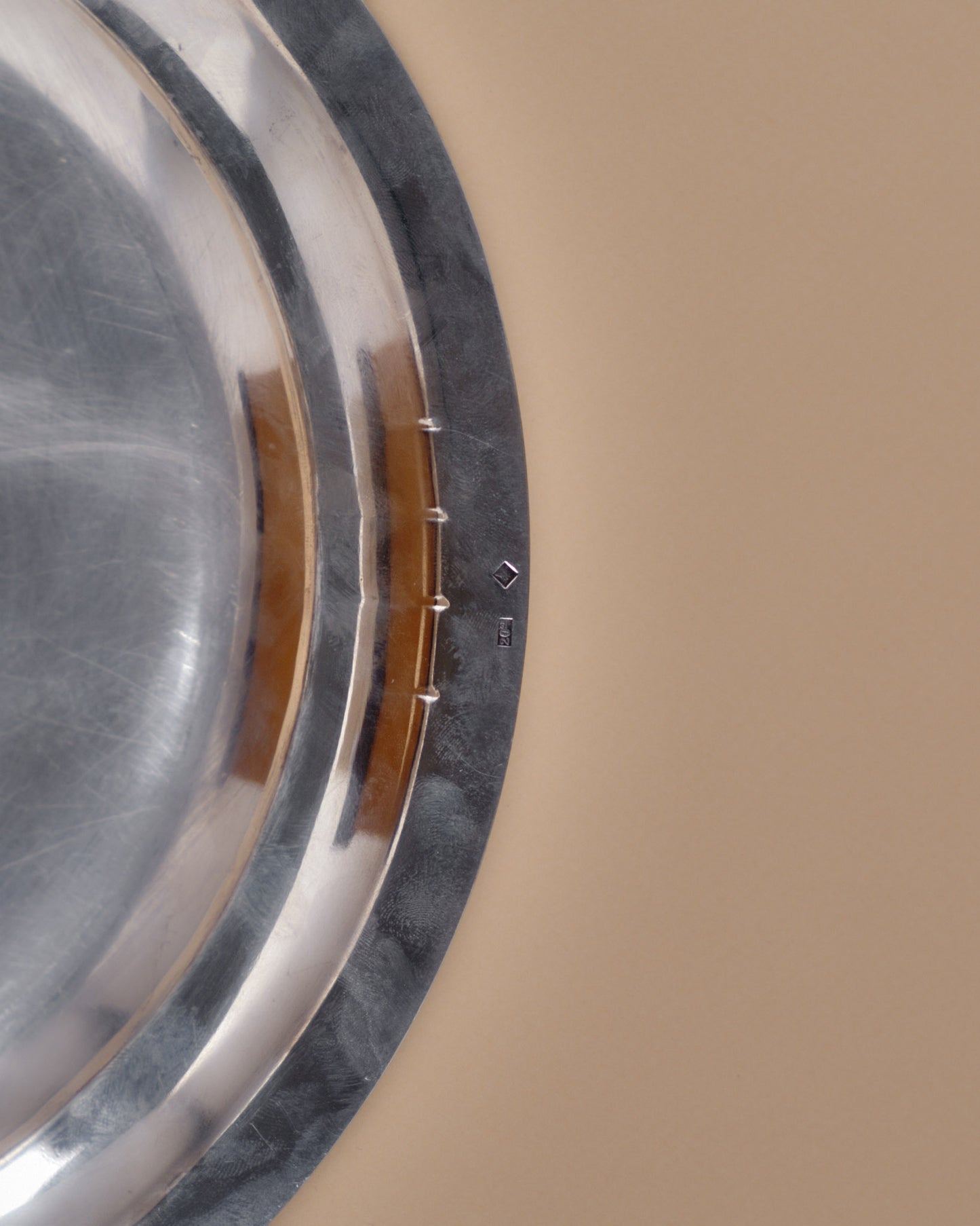 ROUND SILVER-PLATED METAL PLATE, SAMUEL ASKENFELD