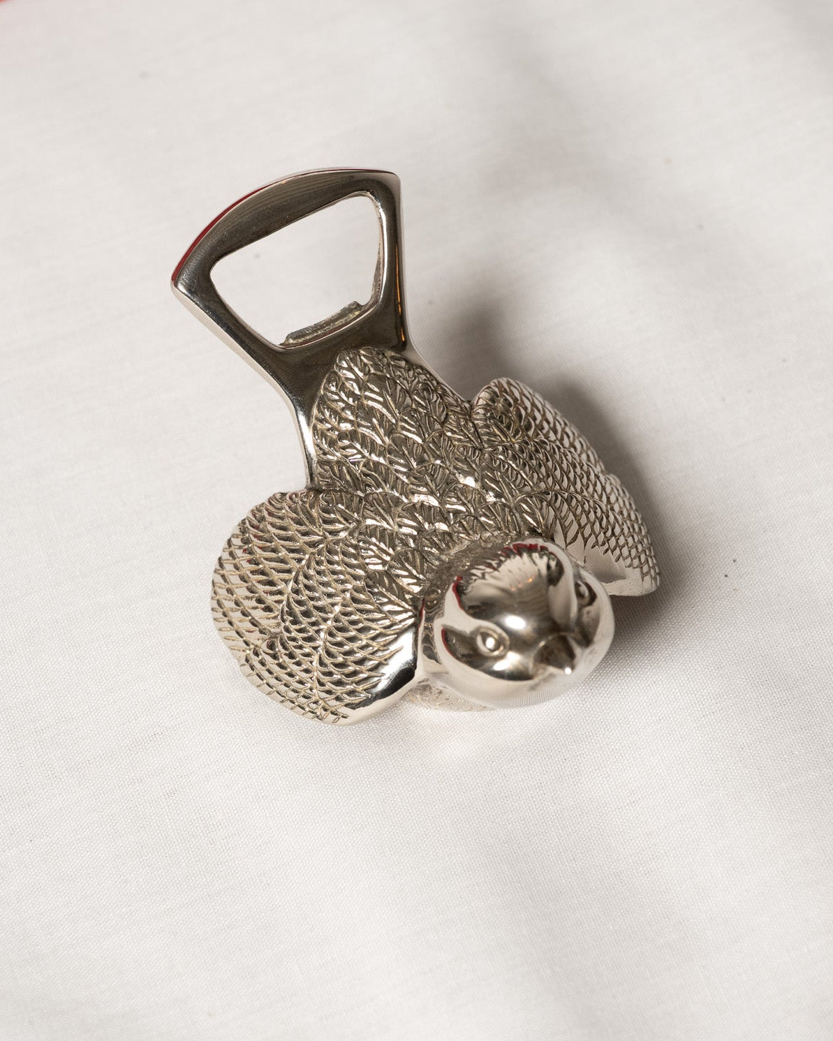 Metal bottle opener, 1970s