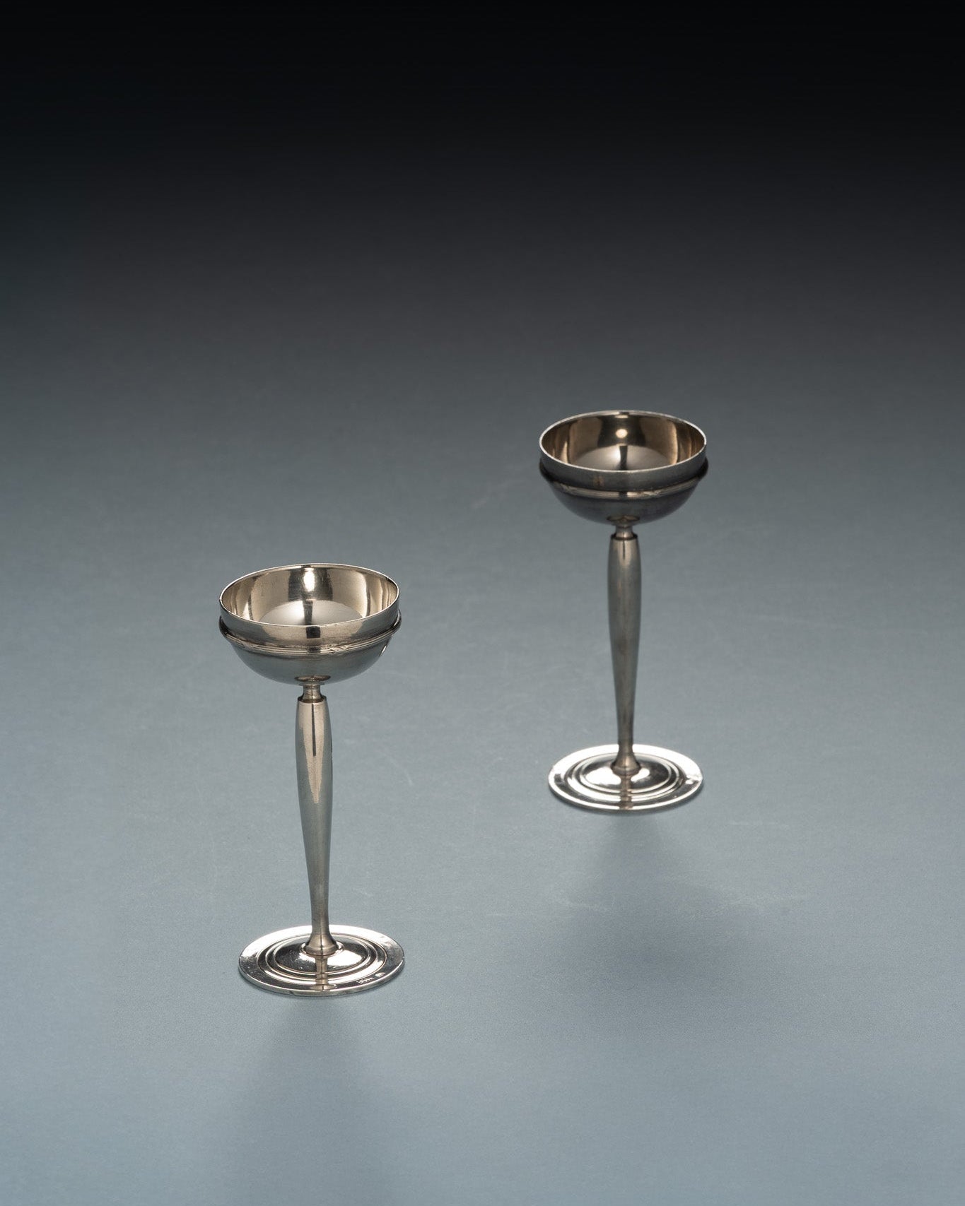 Pair of Art Deco silver-plated metal egg cups, 1930s
