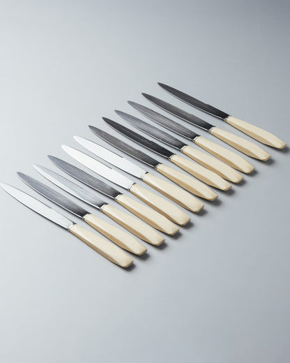 MÉNAGÈRE EN MÉTAL ARGENTÉ, INOX ET PORCELAINE, 1940s
