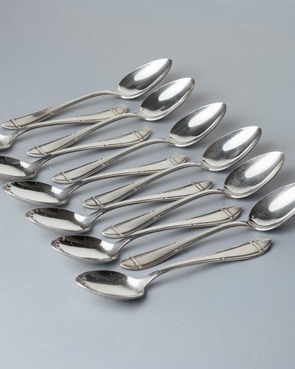 MÉNAGÈRE EN MÉTAL ARGENTÉ, INOX ET PORCELAINE, 1940s