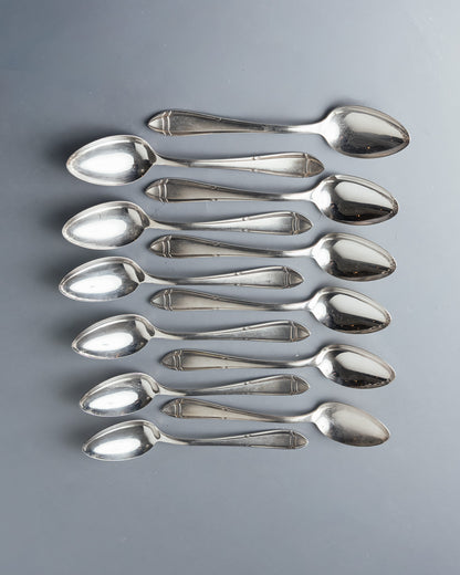 MÉNAGÈRE EN MÉTAL ARGENTÉ, INOX ET PORCELAINE, 1940s