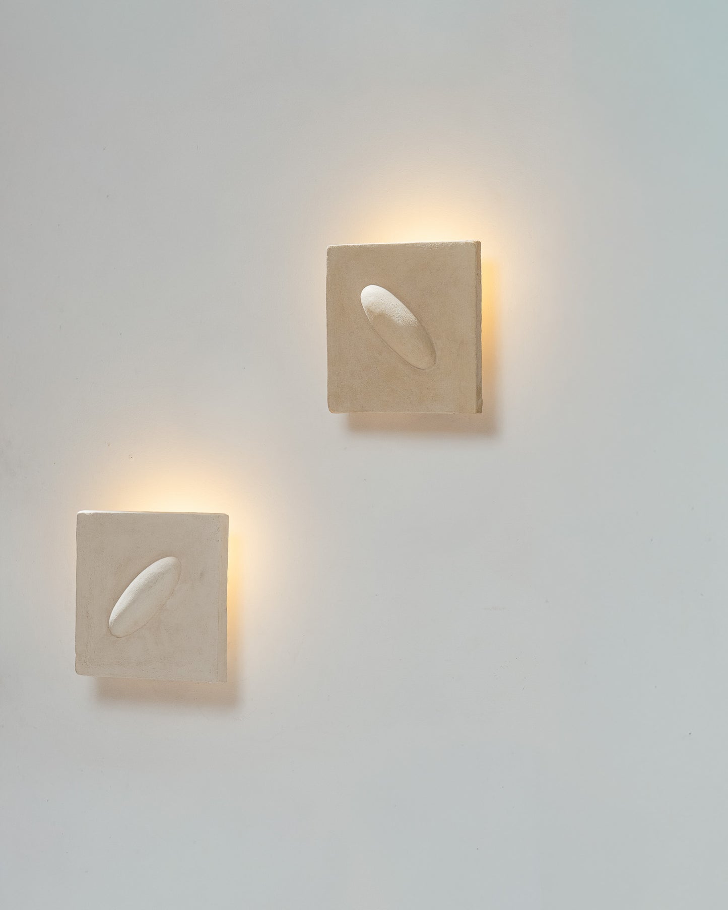PAIR OF SCULPTURAL CHAMOTTE CLAY SCONCES