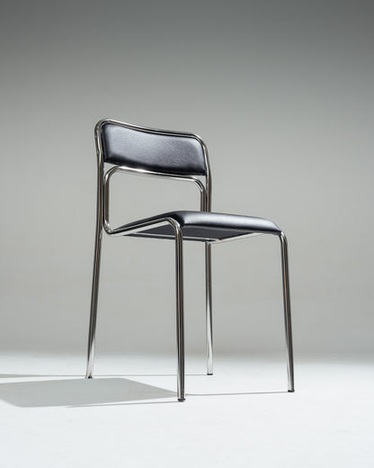 CHAISE EN ACIER TUBULAIRE ET SIMILI CUIR NOIR, 1980s
