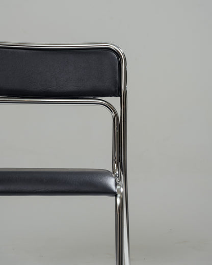 PAIRE DE CHAISES EN ACIER TUBULAIRE ET SIMILI CUIR NOIR, 1980s