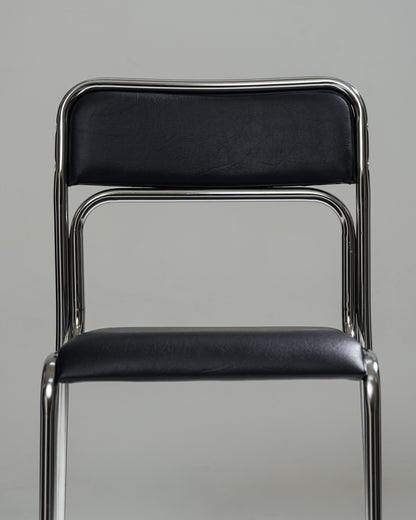 CHAISE EN ACIER TUBULAIRE ET SIMILI CUIR NOIR, 1980s