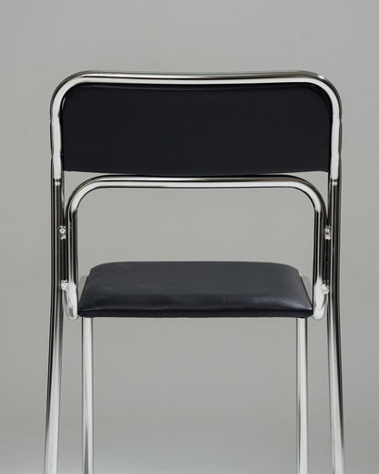 CHAISE EN ACIER TUBULAIRE ET SIMILI CUIR NOIR, 1980s