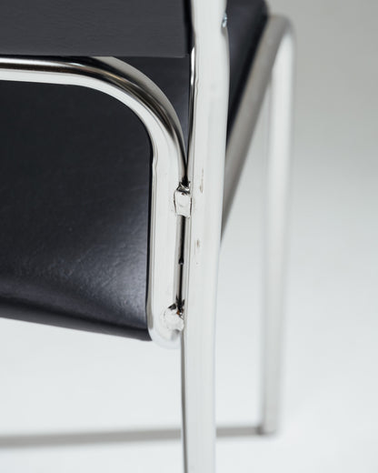 CHAISE EN ACIER TUBULAIRE ET SIMILI CUIR NOIR, 1980s