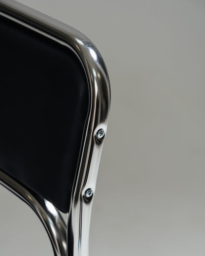 CHAISE EN ACIER TUBULAIRE ET SIMILI CUIR NOIR, 1980s