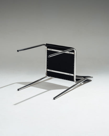 CHAISE EN ACIER TUBULAIRE ET SIMILI CUIR NOIR, 1980s