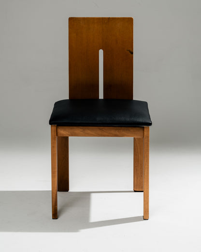 SET OF 4 SCULPTURAL WOOD AND LEATHER CHAIRS, 1970s