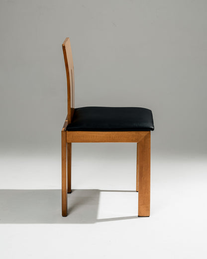 SET OF 4 SCULPTURAL WOOD AND LEATHER CHAIRS, 1970s
