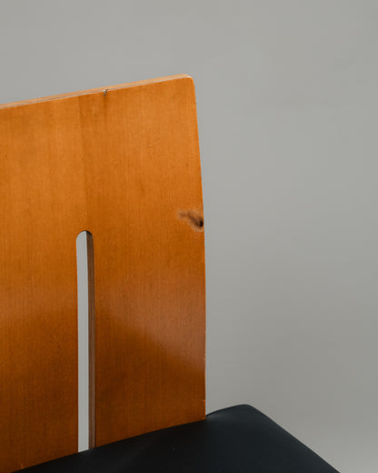 SET OF 4 SCULPTURAL WOOD AND LEATHER CHAIRS, 1970s