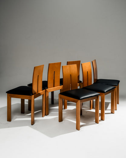SET OF 4 SCULPTURAL WOOD AND LEATHER CHAIRS, 1970s