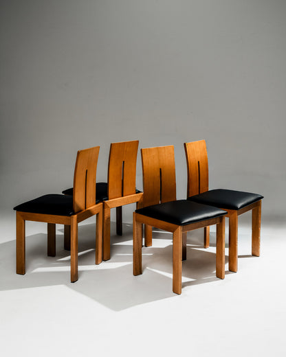 SET OF 4 SCULPTURAL WOOD AND LEATHER CHAIRS, 1970s