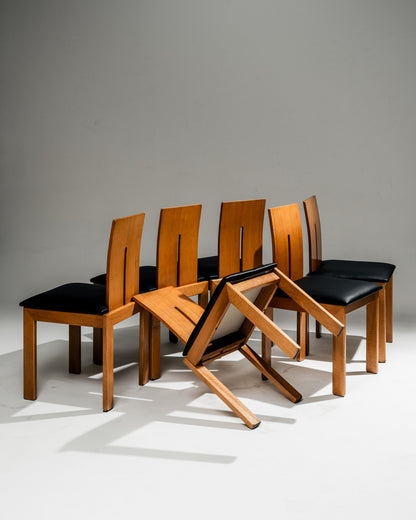 SET OF 4 SCULPTURAL WOOD AND LEATHER CHAIRS, 1970s
