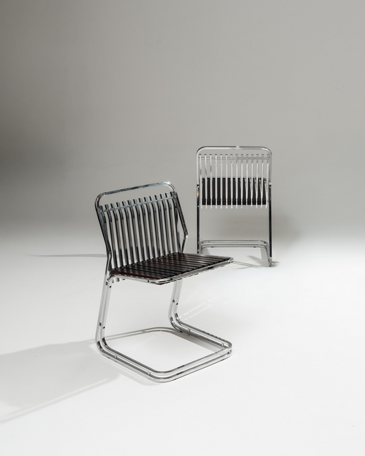 PAIR OF CANTILEVER CHAIRS IN CHROMED STEEL AND WOOD, 1970s