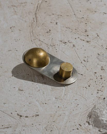 CANDLE HOLDER FROM THE "ÉPURE" COLLECTION IN BRASS