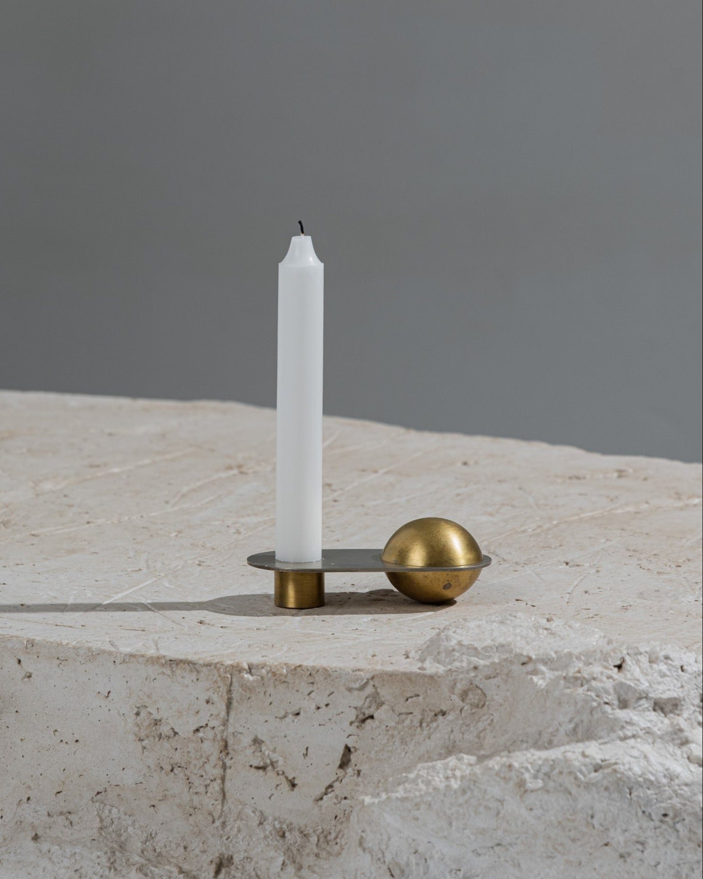 CANDLE HOLDER FROM THE "ÉPURE" COLLECTION IN BRASS
