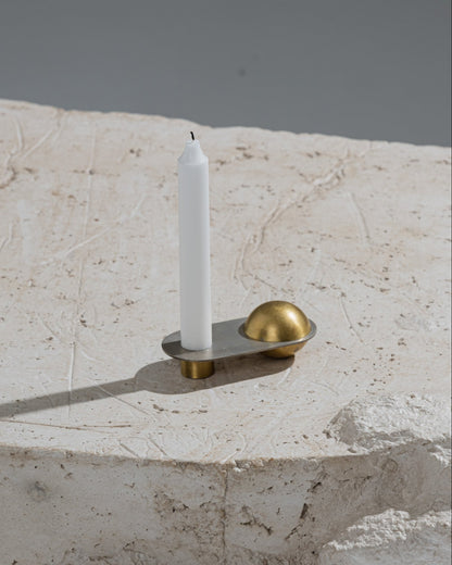 CANDLE HOLDER FROM THE "ÉPURE" COLLECTION IN BRASS
