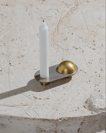 CANDLE HOLDER FROM THE "ÉPURE" COLLECTION IN BRASS