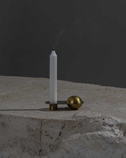 CANDLE HOLDER FROM THE "ÉPURE" COLLECTION IN BRASS
