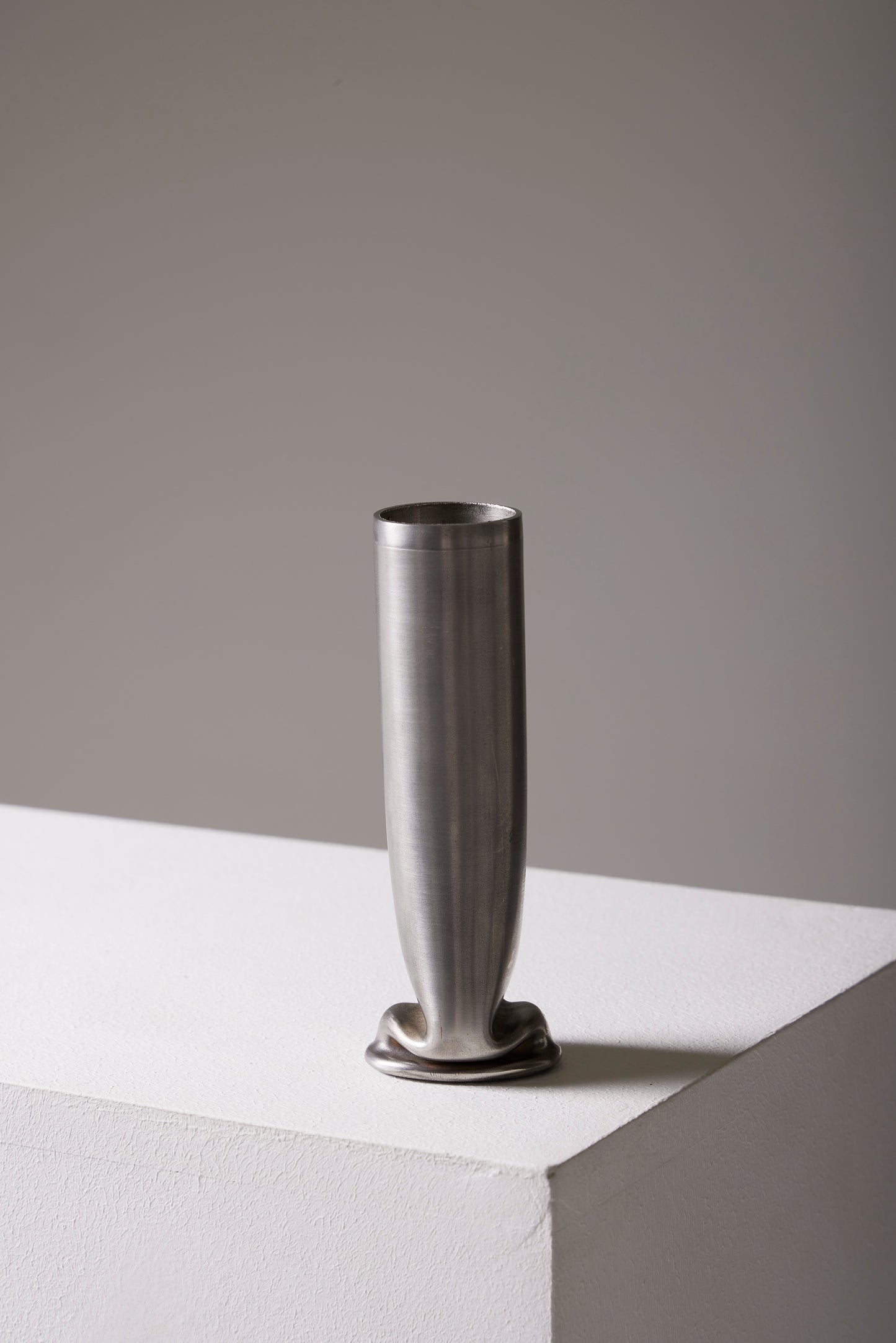 COMPRESSION STAINLESS STEEL VASE