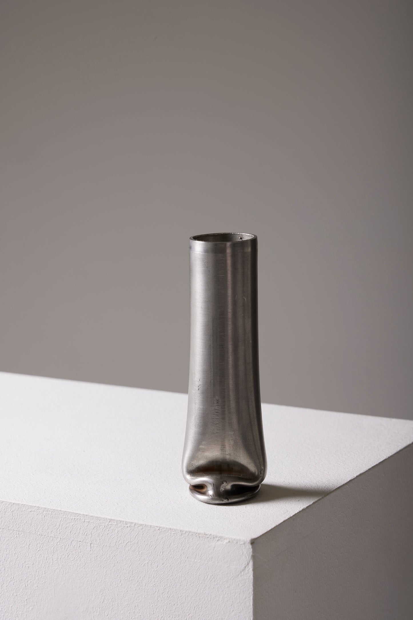 COMPRESSION STAINLESS STEEL VASE