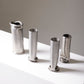 COMPRESSION STAINLESS STEEL VASE