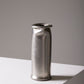 COMPRESSION STAINLESS STEEL VASE