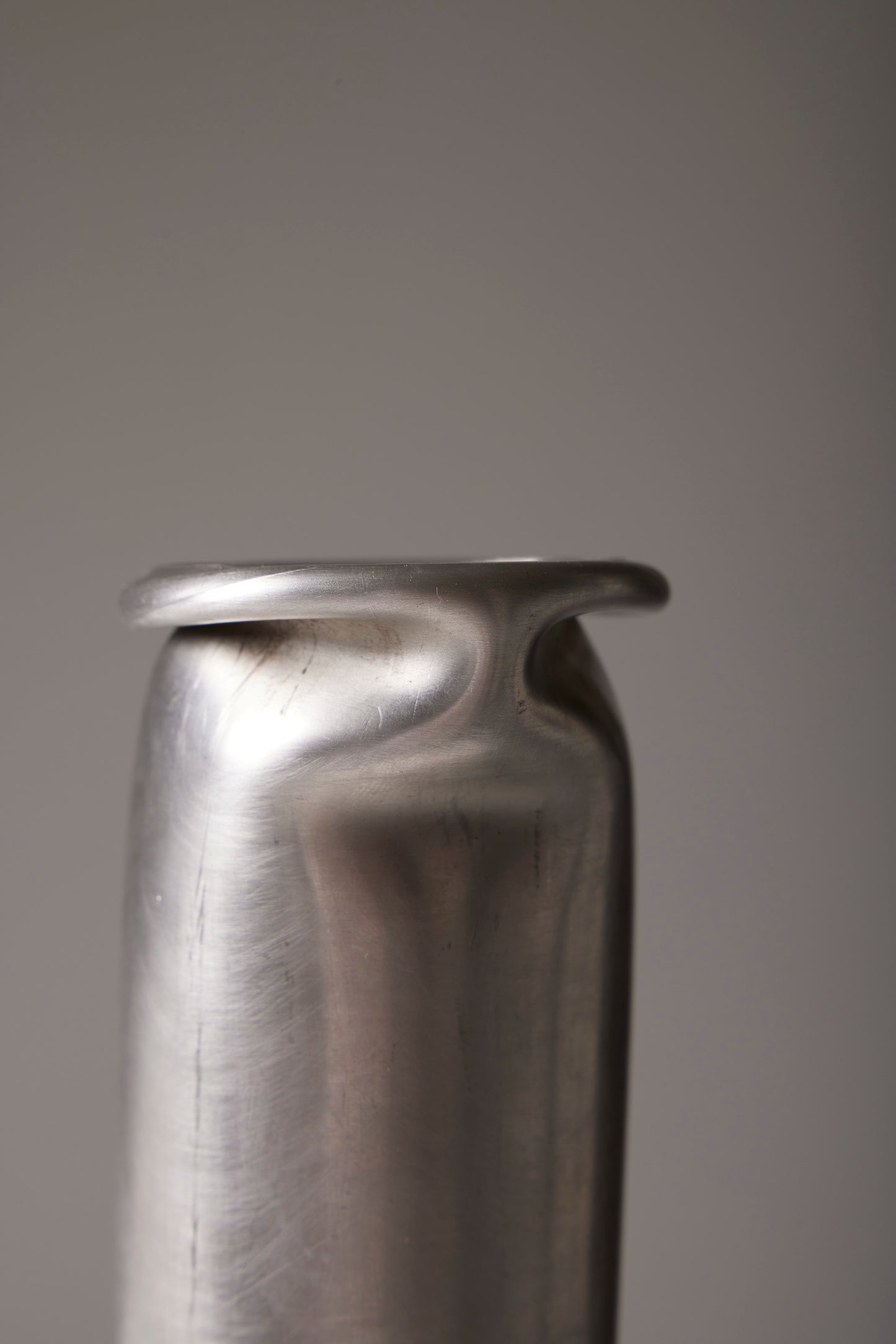 COMPRESSION STAINLESS STEEL VASE