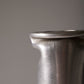 COMPRESSION STAINLESS STEEL VASE