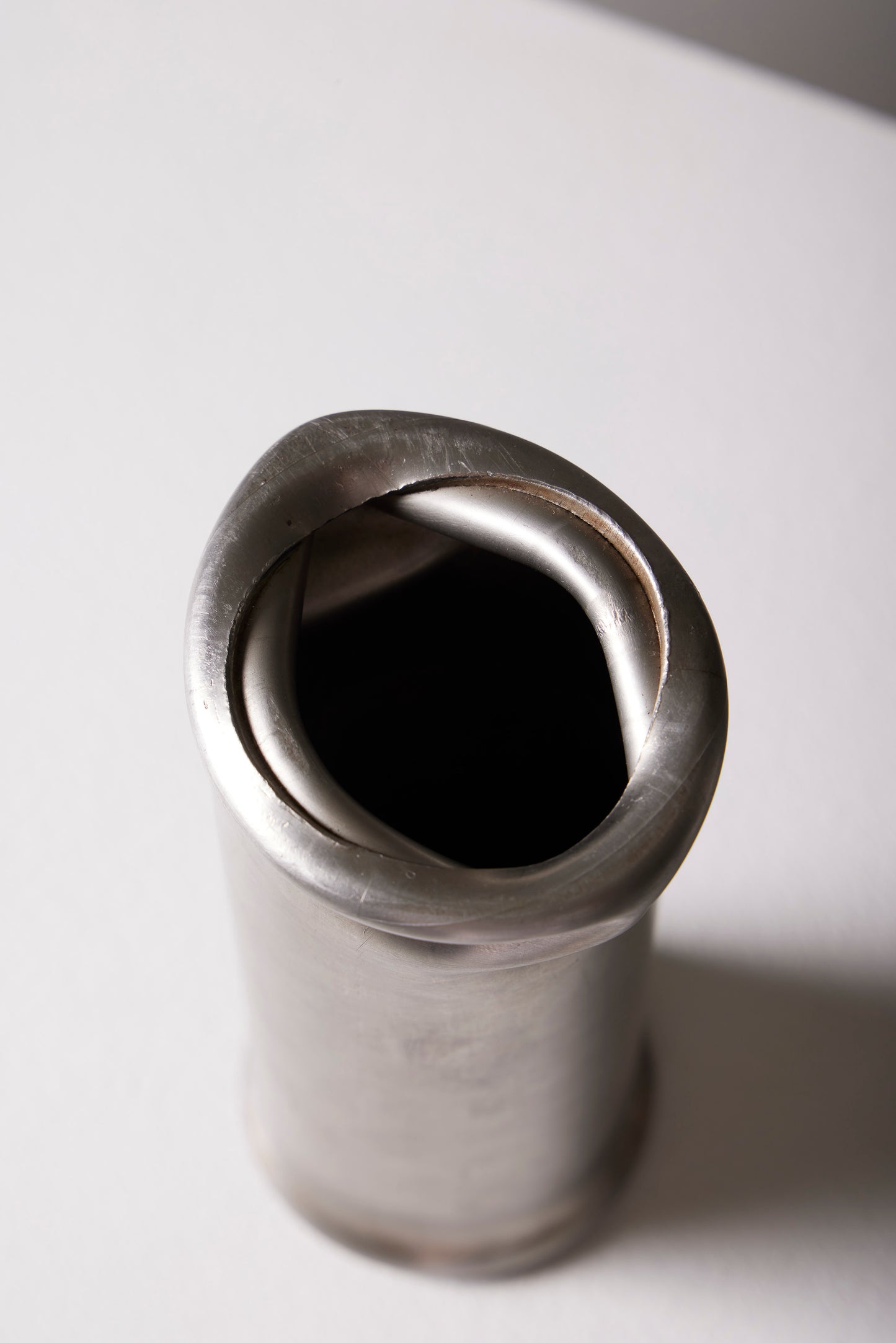 COMPRESSION STAINLESS STEEL VASE