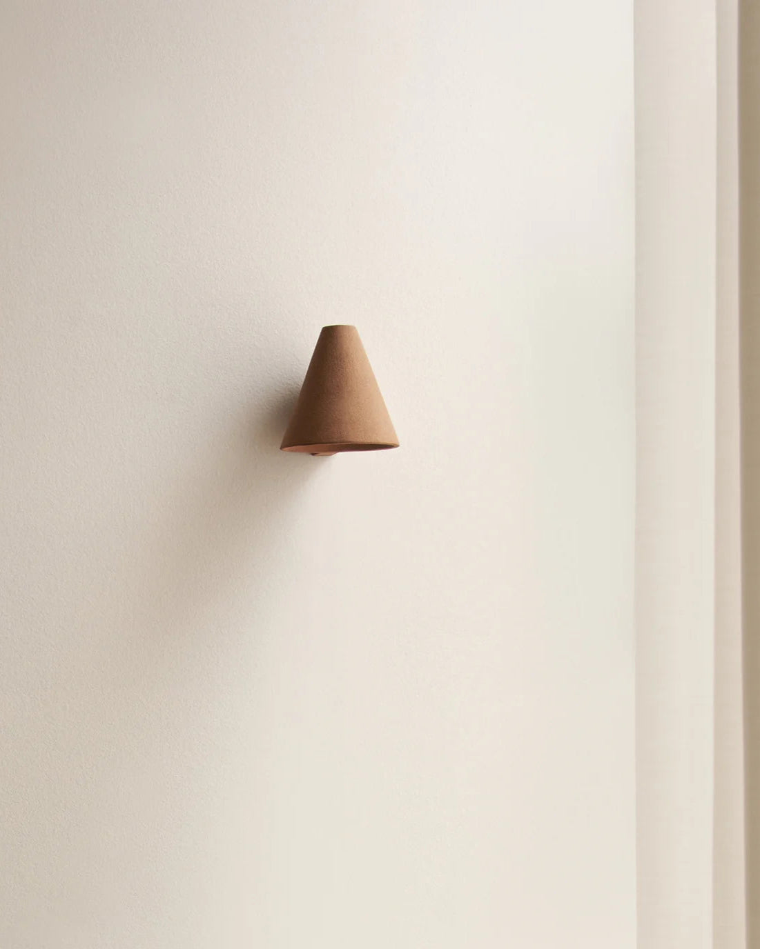 Esoteric wall light