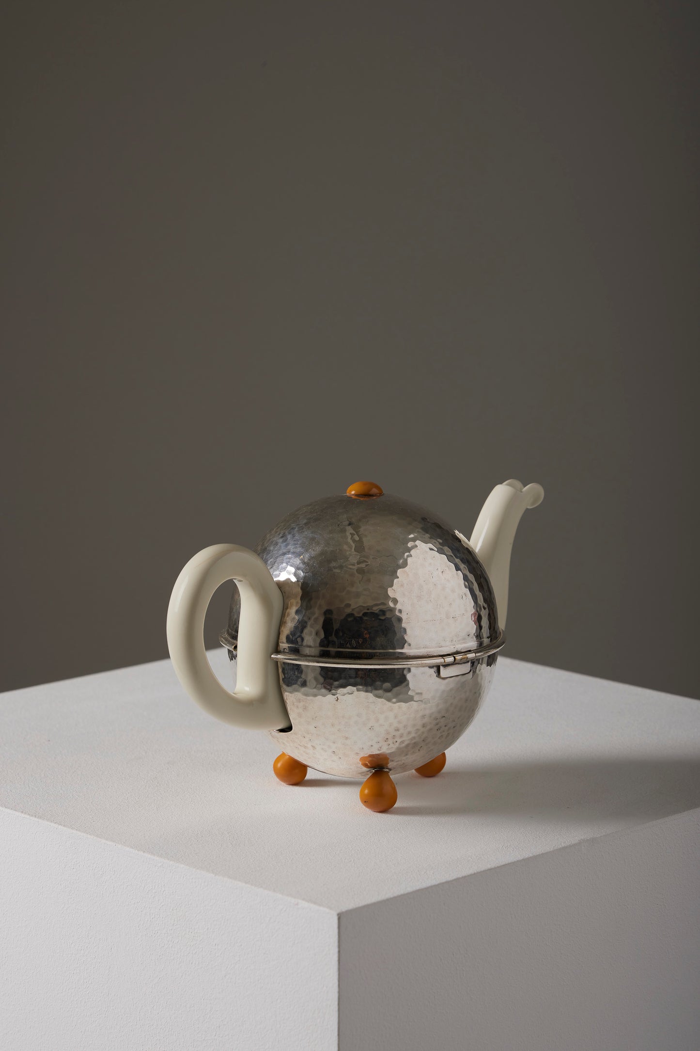 Ceramic and metal teapot