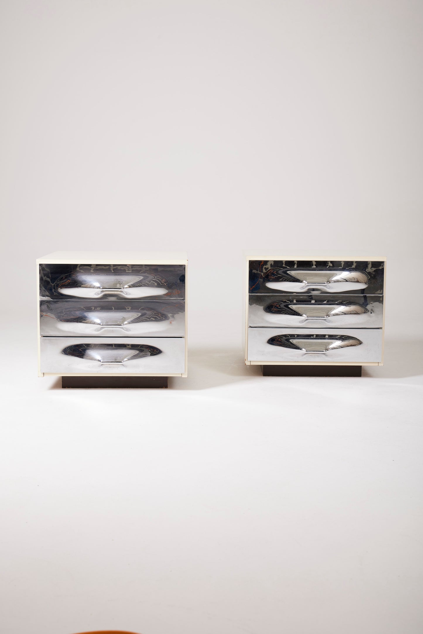 PAIR OF RAYMOND LOEWY BEDSIDE TABLES