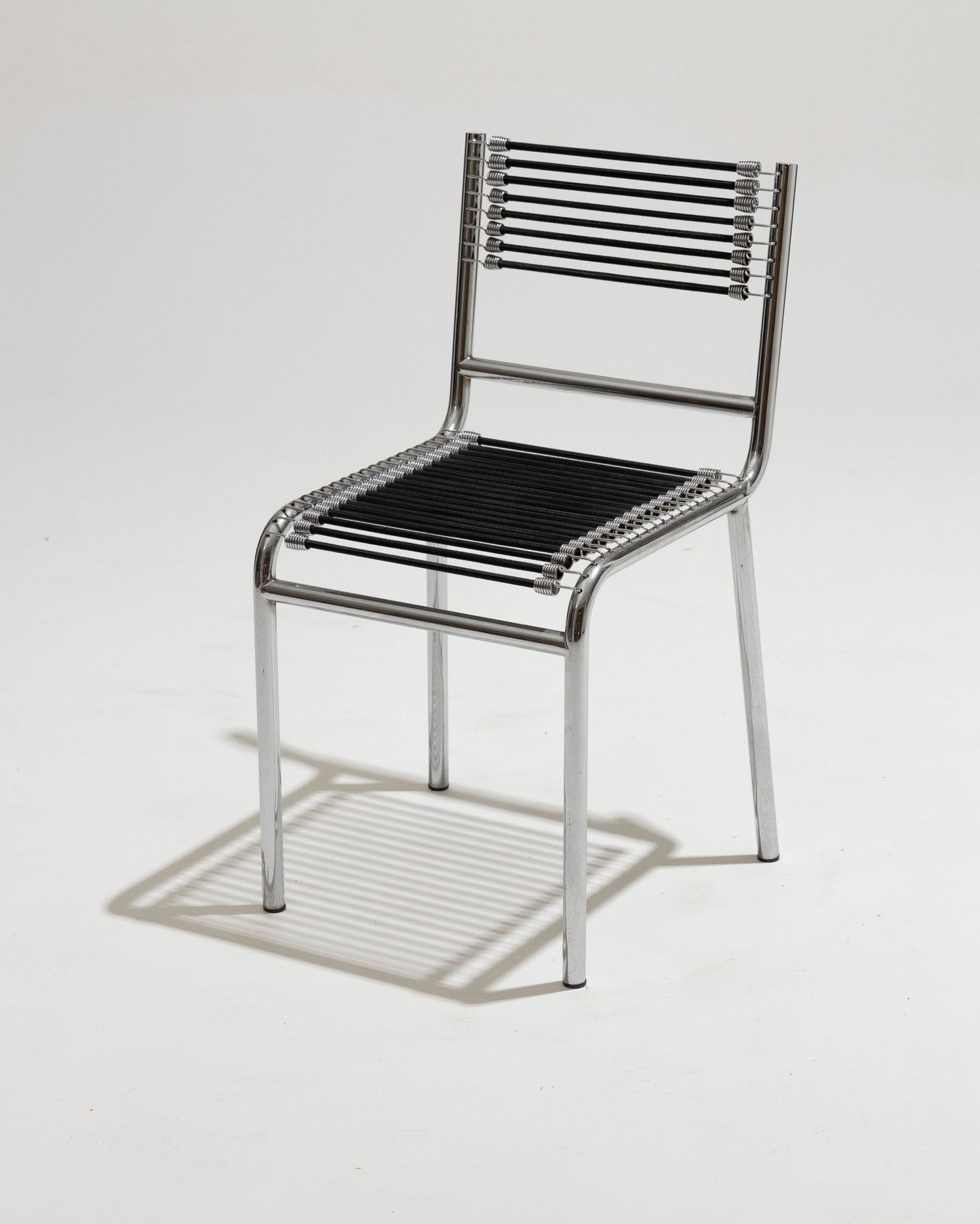 CHAISE EN ACIER ET CORDE ÉLASTIQUE, RENÉ HERBST, 1970s