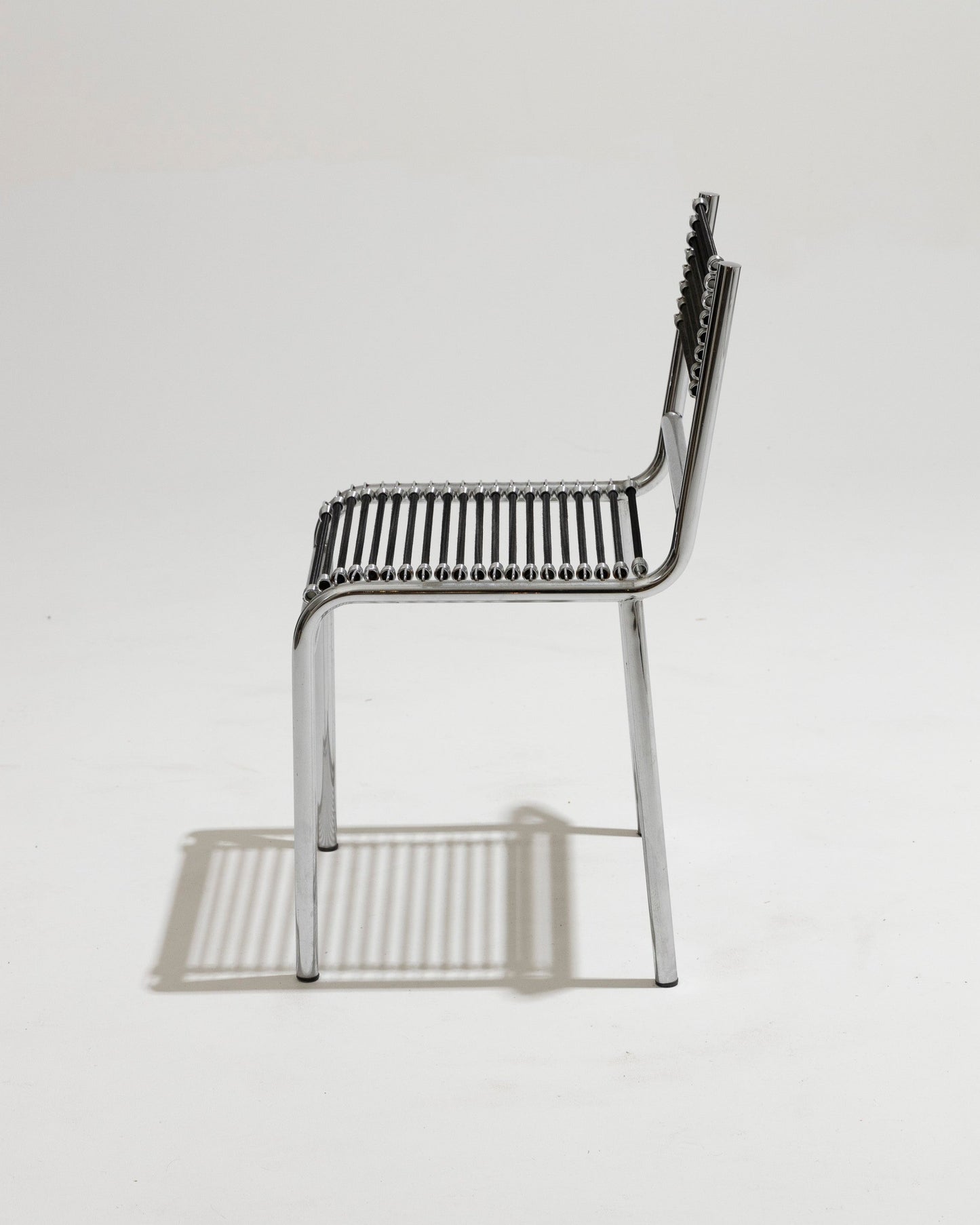 CHAISE EN ACIER ET CORDE ÉLASTIQUE, RENÉ HERBST, 1970s