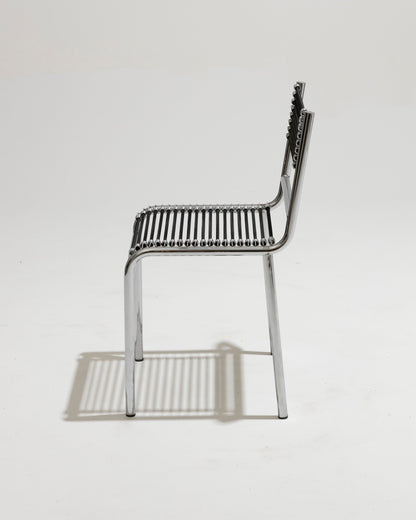 STEEL AND ELASTIC CORD CHAIR, RENÉ HERBST, 1970s