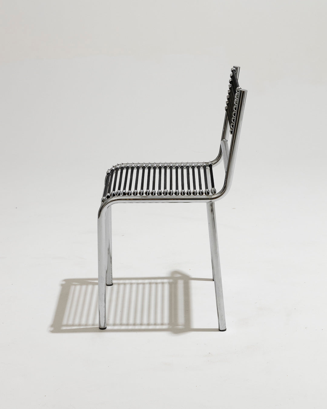 SET OF 4 STEEL AND ELASTIC ROPE CHAIRS, RENÉ HERBST, 1970s 