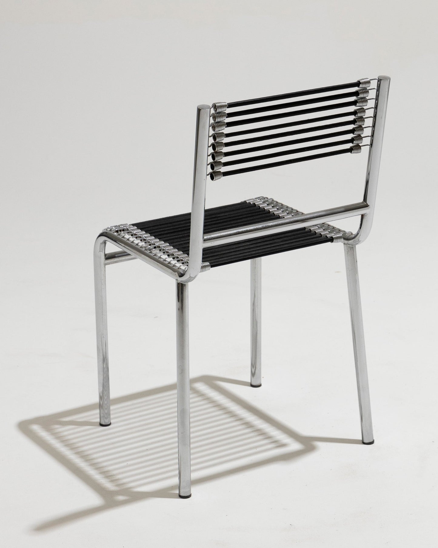 CHAISE EN ACIER ET CORDE ÉLASTIQUE, RENÉ HERBST, 1970s